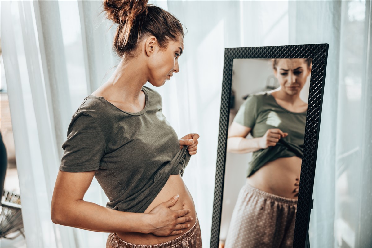 ventre gonflé comme une femme enceinte